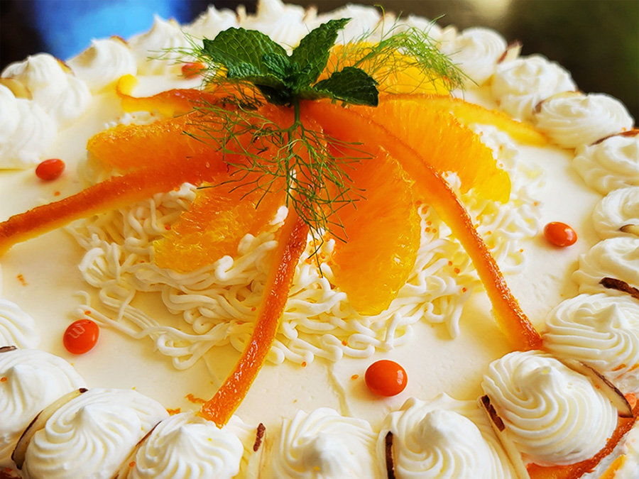 Mandarin oranges on a beautifully decorated cake prepared by a Park City Culinary Institute student.